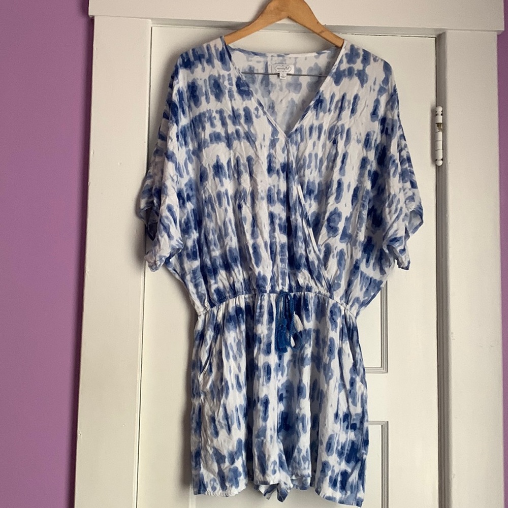 Only tried on once. No Tags. Still New. The colors are Blue and White